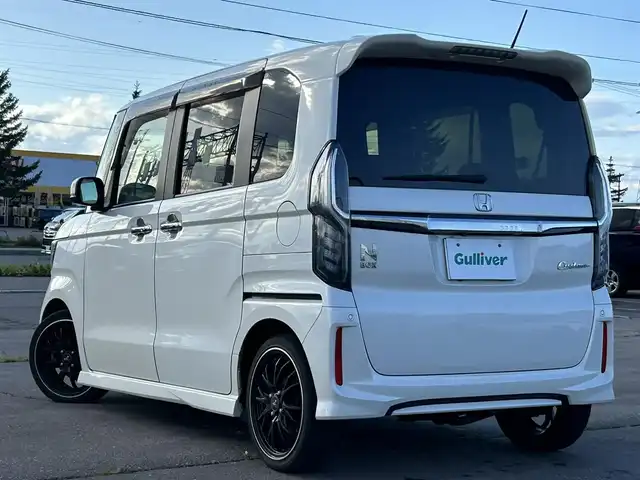 ホンダ Ｎ ＢＯＸ カスタム G L ターボ ホンダセンシング 道南・函館 2017(平29)年 6.7万km プレミアムホワイトパールⅡ /社外ナビ//フルセグＴＶ//純正ＡＷ付き夏冬タイヤ//純正エンジンスターター//バックカメラ//クルーズコントロール//衝突被害軽減ブレーキ//レーンキープアシスト//シートヒーター//オートハイビーム//LEDヘッドライト//両側パワースライドドア//横滑り防止装置//スマートキー