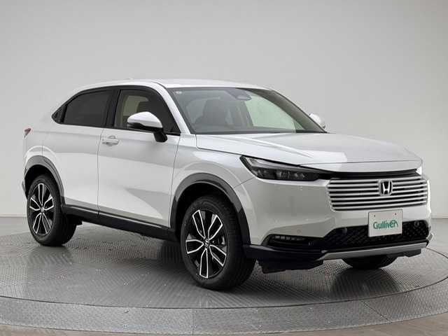 ホンダ ヴェゼル ハイブリッド e:HEV Z 兵庫県 2025(令7)年 0.1千km プラチナホワイトパール 登録済未使用車/純正ディスプレイオーディオ/純正メモリナビ/（Bluetooth/フルセグ)/ApplecarPlay/AndroidAuto/ワイヤレス充電/コーナーセンサー/LKA/PCS/BSM/ACC/バックカメラ/パドルシフト/ビルトインETC2.0/D+N席シートヒーター/ハーフレザー/LEDヘッドライト/LEDフォグランプ/オートハイビーム/純正18インチアルミホイール/スペアキー×１