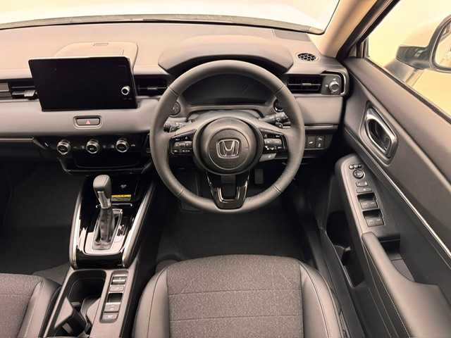 ホンダ ヴェゼル ハイブリッド e:HEV Z 兵庫県 2025(令7)年 0.1千km プラチナホワイトパール 登録済未使用車/純正ディスプレイオーディオ/純正メモリナビ/（Bluetooth/フルセグ)/ApplecarPlay/AndroidAuto/ワイヤレス充電/コーナーセンサー/LKA/PCS/BSM/ACC/バックカメラ/パドルシフト/ビルトインETC2.0/D+N席シートヒーター/ハーフレザー/LEDヘッドライト/LEDフォグランプ/オートハイビーム/純正18インチアルミホイール/スペアキー×１