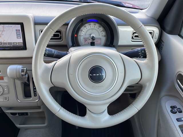 スズキ ラパン X 道東・釧路十勝 2015(平27)年 9.1万km カシスピンクパールメタリック ・４WD/・社外SDメモリナビ/（CD・DVD・BT・フルセグ・ラジオ）/・バックカメラ/・前席シートヒーター/・純正フロアマット/・アイドリングストップ/・ETC２.0/・社外エンジンスターター/・電動格納ミラー/・ウィンカーミラー/・ドアバイザー/・LEDヘッドリト/・オートライト/・横滑り防止装置/・衝突被害軽減ブレーキ/・保証書/・取扱説明書