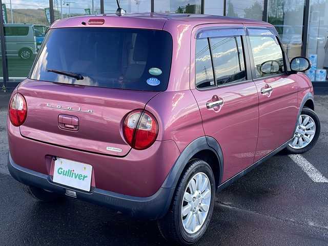 スズキ ラパン X 道東・釧路十勝 2015(平27)年 9.1万km カシスピンクパールメタリック ・４WD/・社外SDメモリナビ/（CD・DVD・BT・フルセグ・ラジオ）/・バックカメラ/・前席シートヒーター/・純正フロアマット/・アイドリングストップ/・ETC２.0/・社外エンジンスターター/・電動格納ミラー/・ウィンカーミラー/・ドアバイザー/・LEDヘッドリト/・オートライト/・横滑り防止装置/・衝突被害軽減ブレーキ/・保証書/・取扱説明書