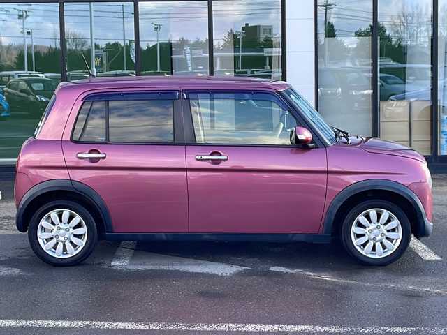 スズキ ラパン X 道東・釧路十勝 2015(平27)年 9.1万km カシスピンクパールメタリック ・４WD/・社外SDメモリナビ/（CD・DVD・BT・フルセグ・ラジオ）/・バックカメラ/・前席シートヒーター/・純正フロアマット/・アイドリングストップ/・ETC２.0/・社外エンジンスターター/・電動格納ミラー/・ウィンカーミラー/・ドアバイザー/・LEDヘッドリト/・オートライト/・横滑り防止装置/・衝突被害軽減ブレーキ/・保証書/・取扱説明書