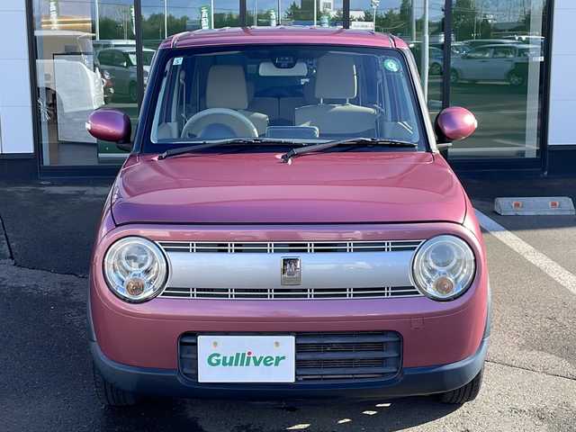 スズキ ラパン X 道東・釧路十勝 2015(平27)年 9.1万km カシスピンクパールメタリック ・４WD/・社外SDメモリナビ/（CD・DVD・BT・フルセグ・ラジオ）/・バックカメラ/・前席シートヒーター/・純正フロアマット/・アイドリングストップ/・ETC２.0/・社外エンジンスターター/・電動格納ミラー/・ウィンカーミラー/・ドアバイザー/・LEDヘッドリト/・オートライト/・横滑り防止装置/・衝突被害軽減ブレーキ/・保証書/・取扱説明書