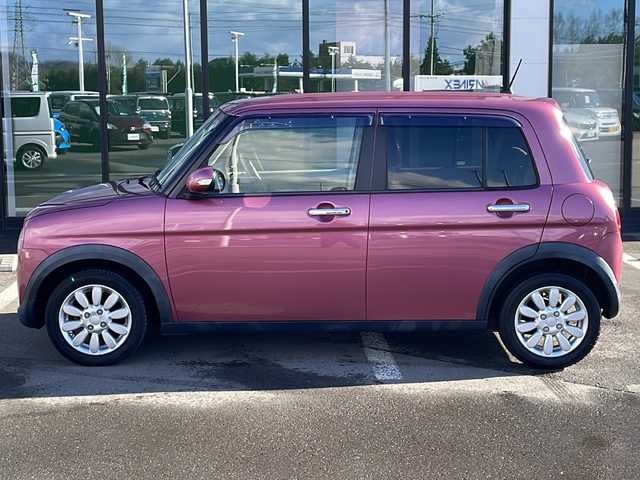 スズキ ラパン X 道東・釧路十勝 2015(平27)年 9.1万km カシスピンクパールメタリック ・４WD/・社外SDメモリナビ/（CD・DVD・BT・フルセグ・ラジオ）/・バックカメラ/・前席シートヒーター/・純正フロアマット/・アイドリングストップ/・ETC２.0/・社外エンジンスターター/・電動格納ミラー/・ウィンカーミラー/・ドアバイザー/・LEDヘッドリト/・オートライト/・横滑り防止装置/・衝突被害軽減ブレーキ/・保証書/・取扱説明書