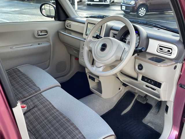 スズキ ラパン X 道東・釧路十勝 2015(平27)年 9.1万km カシスピンクパールメタリック ・４WD/・社外SDメモリナビ/（CD・DVD・BT・フルセグ・ラジオ）/・バックカメラ/・前席シートヒーター/・純正フロアマット/・アイドリングストップ/・ETC２.0/・社外エンジンスターター/・電動格納ミラー/・ウィンカーミラー/・ドアバイザー/・LEDヘッドリト/・オートライト/・横滑り防止装置/・衝突被害軽減ブレーキ/・保証書/・取扱説明書