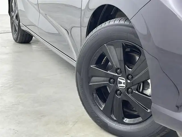 ホンダ フリード ハイブリット G ブラックスタイル 福岡県 2022(令4)年 2.1万km トワイライトミストブラックパール ワンオーナー　/純正８型ナビ／フルセグＴＶ　/TVキャンセラー　/バックカメラ　/前後ドラレコ　/ＥＴＣ　/レーダークルーズコントロール　/コーナーセンサー　/衝突被害軽減ブレーキ　/レーンキープ　/両側電動スライドドア　/シートヒーター　/純正１５インチアルミホイール　/LEDヘッドライト