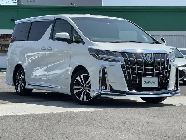 トヨタ アルファード S Cパッケージ 徳島県 2023(令5)年 1.3万km ホワイトパールクリスタルシャイン 純正ナビ/(AM.FM.BT.Miracast)/モデリスタフルエアロ/サンルーフ/ブラインドスポットモニター/レーダークルーズコントロール/レザーシート/パワーシート/シートヒーター/エアシート/ハンドルヒーター/デジタルインナーミラー/純正18インチアルミホイール/純正フロアマット/衝突被害軽減システム/レーンキープアシスト/オートマチックハイビーム/前後コーナーセンサー/ドライブレコーダー/バックカメラ/ETC/プッシュスタート/スマートキー
