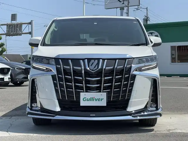 トヨタ アルファード S Cパッケージ 徳島県 2023(令5)年 1.3万km ホワイトパールクリスタルシャイン 純正ナビ/(AM.FM.BT.Miracast)/モデリスタフルエアロ/サンルーフ/ブラインドスポットモニター/レーダークルーズコントロール/レザーシート/パワーシート/シートヒーター/エアシート/ハンドルヒーター/デジタルインナーミラー/純正18インチアルミホイール/純正フロアマット/衝突被害軽減システム/レーンキープアシスト/オートマチックハイビーム/前後コーナーセンサー/ドライブレコーダー/バックカメラ/ETC/プッシュスタート/スマートキー