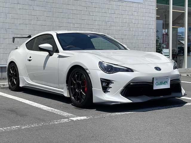 トヨタ ８６ GT リミテッド 静岡県 2016(平28)年 4.2万km パール 社外ナビ/地デジTV/社外CD/DVD/Bluetooth/TRDエアロ/TRDマフラー/HKS車高調/RUNDUCEブレーキキット/VOLKRACING18インチAW/TRDタワーバー/ヴァレンティヘッドライト/ヴァレンティテールランプ/ハーフレザーシート/シートヒーター/社外カーボンGTウイング/社外エアクリーナー/スマートキー/ETC