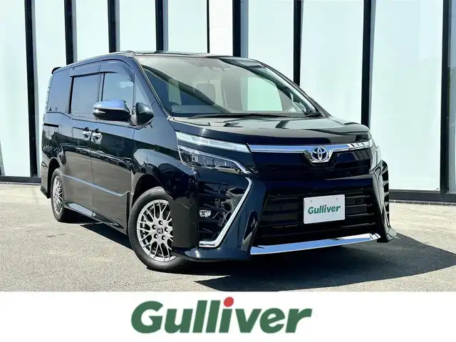 トヨタ ヴォクシー ハイブリッド ZS 煌Ⅲ 大阪府 2020(令2)年 3.7万km ブラック 社外ナビ/  フルセグTV/CD/Bluetooth/バックモニター/衝突軽減ブレーキ/横滑り防止装置/コーナーセンサー/前席シートヒーター/両側パワースライドドア/クルーズコントロール/レーンキープアシスト/ドライブレコーダー/オートマチックハイビーム/純正16インチアルミホイール/純正フロアマット/スマートキー/ＥＴＣ/ＬＥＤ