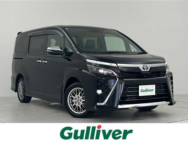 トヨタ ヴォクシー ハイブリッド ZS 煌Ⅲ 大阪府 2020(令2)年 3.7万km ブラック 社外ナビ/  フルセグTV/CD/Bluetooth/バックモニター/衝突軽減ブレーキ/横滑り防止装置/コーナーセンサー/前席シートヒーター/両側パワースライドドア/クルーズコントロール/レーンキープアシスト/ドライブレコーダー/オートマチックハイビーム/純正16インチアルミホイール/純正フロアマット/スマートキー/ＥＴＣ/ＬＥＤ