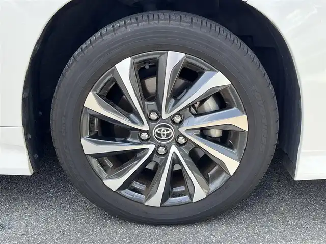 トヨタ ヴォクシー S－Z 奈良県 2023(令5)年 1.6万km ホワイトパールクリスタルシャイン 純正１０．５インチナビ　/フルセグＴＶ　/BT/CD/DVD/HDMI/１４インチフリップダウンモニター　/ＥＴＣ２．０　/バックカメラ　/前後ドライブレコーダー　/両側パワースライドドア　/３眼ＬＥＤヘッドライト　/シートヒーター　/スマートキー/追従型クルーズコントロール/前後コーナーセンサー/BSM/AUTOHOLD/純正17インチアルミホイール/フロアマット