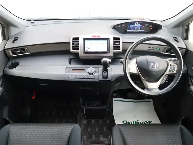 ホンダ フリード スパイク ハイブリット ジャストセレクション 石川県 2013(平25)年 10.8万km プレミアムブラキッシュパール スマートキー/スペアキー/オートライト/HIDライト/クルーズコントロール/社外ナビゲーション/フルセグテレビ/Bluetooth/USB/HDMIケーブル/左片側パワースライドドア/アイドリングストップ/ETC/電動格納ミラー/純正フロアマット