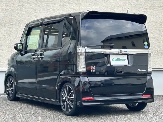 ホンダ Ｎ ＢＯＸ カスタム G Lパッケージ 大阪府 2015(平27)年 9.5万km スマートブラック 社外メモリナビ（AVIC-ZH0999）/BT/CD/DVD/フルセグTV/iPod/両側パワースライドドア/バックカメラ/アイドリングストップ/オートライト/横滑り防止装置/プッシュスタート/後席ロールサンシェード/シートバックテーブル/純正フロアマット/フロントフォグランプ/車高調（TEIN）/ETC