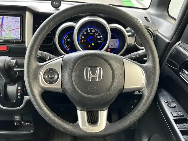 ホンダ Ｎ ＢＯＸ カスタム G Lパッケージ 大阪府 2015(平27)年 9.5万km スマートブラック 社外メモリナビ（AVIC-ZH0999）/BT/CD/DVD/フルセグTV/iPod/両側パワースライドドア/バックカメラ/アイドリングストップ/オートライト/横滑り防止装置/プッシュスタート/後席ロールサンシェード/シートバックテーブル/純正フロアマット/フロントフォグランプ/車高調（TEIN）/ETC