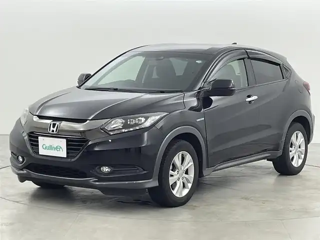 ホンダ ヴェゼル ハイブリッド X ホンダセンシング 福岡県 2016(平28)年 6.6万km クリスタルブラックパール 純正ナビ／フルセグＴＶ　/バックカメラ　/ビルトインＥＴＣ　/アダプティブクルコン　/ホンダセンシング　/コーナーセンサー　/衝突軽減　/レーンキープ　/パドルシフト　/純正１６インチアルミホイール　/ＬＥＤヘッドライト