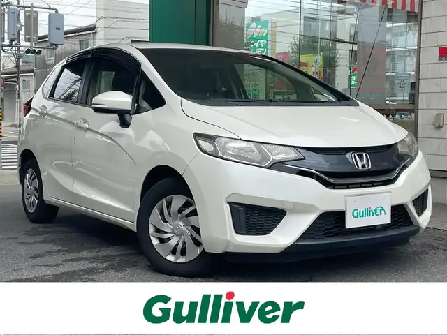 ホンダ フィット 13G Fパッケージ 愛知県 2015(平27)年 9.2万km プレミアムホワイトパール 純正インターナビ〈VXM-155VSI〉/・DVD/USB/SD/・Bluetooth/ワンセグTV/AUX/バックカメラ/ETC/スマートキー＆プッシュスタート