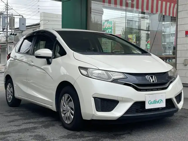 ホンダ フィット 13G Fパッケージ 愛知県 2015(平27)年 9.2万km プレミアムホワイトパール 純正インターナビ〈VXM-155VSI〉/・DVD/USB/SD/・Bluetooth/ワンセグTV/AUX/バックカメラ/ETC/スマートキー＆プッシュスタート