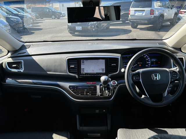 ホンダ オデッセイ ハイブリッド アブソルート ホンダセンシング 茨城県 2017(平29)年 9.2万km プレミアムヴィーナスブラックP 純正ナビ（VXM-175VFEi）/【フルセグTV/CD/DVD/Bluetooth】/バックカメラ/純正フリップダウンモニター/両側パワースライドドア/ホンダセンシング/衝突軽減ブレーキ/レーダークルーズコントロール/レーンキープアシスト/先行車発進お知らせ機能/横滑り防止装置/ECON/黒ハーフレザーシート/運転席パワーシート/純正17インチAW/オートライト/LEDヘッドライト/フォグランプ/革巻きステアリング/ステアリングスイッチ