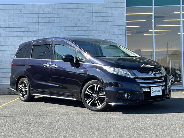 ホンダ オデッセイ ハイブリッド アブソルート ホンダセンシング 茨城県 2017(平29)年 9.2万km プレミアムヴィーナスブラックP 純正ナビ（VXM-175VFEi）/【フルセグTV/CD/DVD/Bluetooth】/バックカメラ/純正フリップダウンモニター/両側パワースライドドア/ホンダセンシング/衝突軽減ブレーキ/レーダークルーズコントロール/レーンキープアシスト/先行車発進お知らせ機能/横滑り防止装置/ECON/黒ハーフレザーシート/運転席パワーシート/純正17インチAW/オートライト/LEDヘッドライト/フォグランプ/革巻きステアリング/ステアリングスイッチ