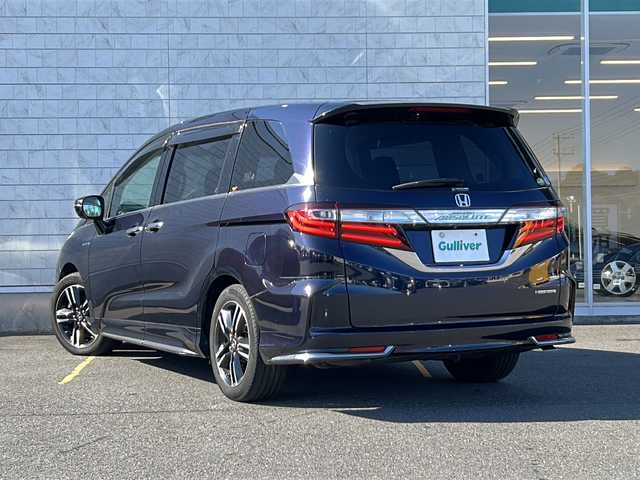 ホンダ オデッセイ ハイブリッド アブソルート ホンダセンシング 茨城県 2017(平29)年 9.2万km プレミアムヴィーナスブラックP 純正ナビ（VXM-175VFEi）/【フルセグTV/CD/DVD/Bluetooth】/バックカメラ/純正フリップダウンモニター/両側パワースライドドア/ホンダセンシング/衝突軽減ブレーキ/レーダークルーズコントロール/レーンキープアシスト/先行車発進お知らせ機能/横滑り防止装置/ECON/黒ハーフレザーシート/運転席パワーシート/純正17インチAW/オートライト/LEDヘッドライト/フォグランプ/革巻きステアリング/ステアリングスイッチ