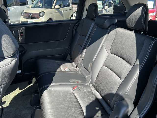 ホンダ オデッセイ ハイブリッド アブソルート ホンダセンシング 茨城県 2017(平29)年 9.2万km プレミアムヴィーナスブラックP 純正ナビ（VXM-175VFEi）/【フルセグTV/CD/DVD/Bluetooth】/バックカメラ/純正フリップダウンモニター/両側パワースライドドア/ホンダセンシング/衝突軽減ブレーキ/レーダークルーズコントロール/レーンキープアシスト/先行車発進お知らせ機能/横滑り防止装置/ECON/黒ハーフレザーシート/運転席パワーシート/純正17インチAW/オートライト/LEDヘッドライト/フォグランプ/革巻きステアリング/ステアリングスイッチ