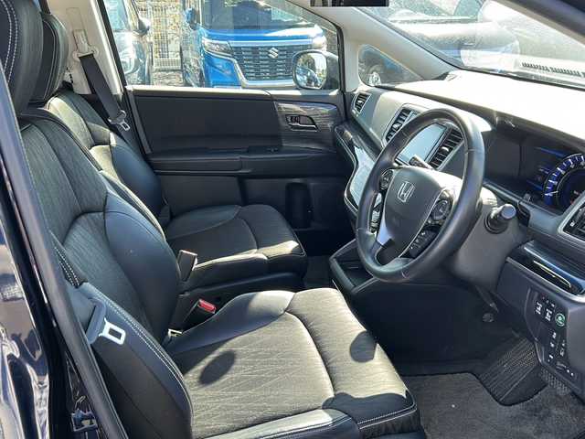 ホンダ オデッセイ ハイブリッド アブソルート ホンダセンシング 茨城県 2017(平29)年 9.2万km プレミアムヴィーナスブラックP 純正ナビ（VXM-175VFEi）/【フルセグTV/CD/DVD/Bluetooth】/バックカメラ/純正フリップダウンモニター/両側パワースライドドア/ホンダセンシング/衝突軽減ブレーキ/レーダークルーズコントロール/レーンキープアシスト/先行車発進お知らせ機能/横滑り防止装置/ECON/黒ハーフレザーシート/運転席パワーシート/純正17インチAW/オートライト/LEDヘッドライト/フォグランプ/革巻きステアリング/ステアリングスイッチ