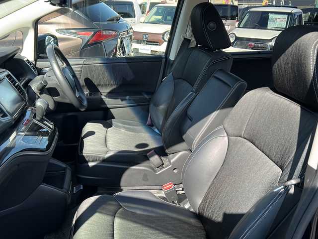 ホンダ オデッセイ ハイブリッド アブソルート ホンダセンシング 茨城県 2017(平29)年 9.2万km プレミアムヴィーナスブラックP 純正ナビ（VXM-175VFEi）/【フルセグTV/CD/DVD/Bluetooth】/バックカメラ/純正フリップダウンモニター/両側パワースライドドア/ホンダセンシング/衝突軽減ブレーキ/レーダークルーズコントロール/レーンキープアシスト/先行車発進お知らせ機能/横滑り防止装置/ECON/黒ハーフレザーシート/運転席パワーシート/純正17インチAW/オートライト/LEDヘッドライト/フォグランプ/革巻きステアリング/ステアリングスイッチ