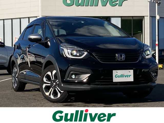 ホンダ フィット e:HEVクロスター 佐賀県 2020(令2)年 4.2万km クリスタルブラックパール Gathers8インチナビ/バックカメラ/衝突被害軽減ブレーキ/路線逸脱警報/コーナーセンサー/アダプティブクルーズコントロール/電動パーキングブレーキ/オートブレーキホールド/ドライブレコーダー/ETC/プッシュスタート/スマートキー/ステアリングリモコン/LEDヘッドライト/フォグライト/純正アルミホイール