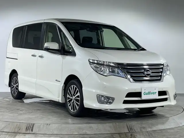 日産 セレナ HWS S HV Vセレ +SeftyⅡ 福岡県 2015(平27)年 6.2万km ブリリアントホワイトパール 純正7型SDナビゲーション【MC314D-W】/(フルセグTV/CD/DVD/BT/SD/USB) /アラウンドビューモニター/純正後席モニター/両側電動スライドドア/サンシェード/エマージェンシーブレーキ/クルーズコントロール/レーンキープ/アイドリングストップ/社外前後ドライブレコーダー/前後クリアランスソナー/革巻きステアリング/ECO/ビルトインETC/プッシュスタート/インテリジェントキー/純正サイドシル/LEDヘッドランプ/オートライト/フロントフォグランプ/純正１６インチアルミホイール