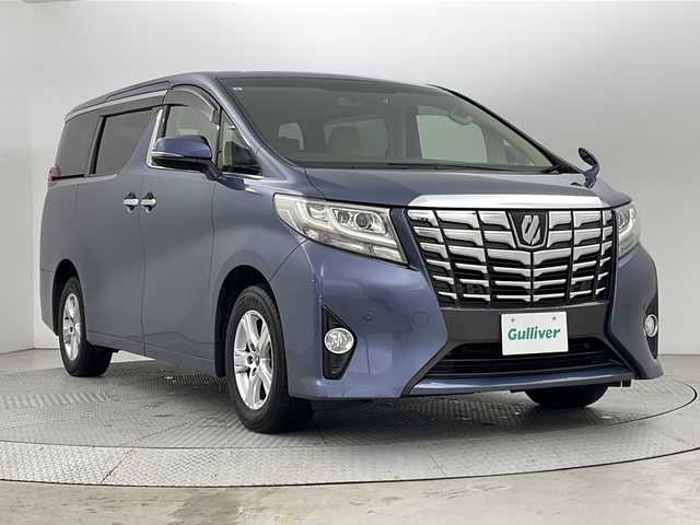 トヨタ アルファード X 新潟県 2017(平29)年 6.1万km グレイッシュブルーマイカメタリック 4WD/衝突被害軽減ブレーキ/純正フリップダウンモニター/純正9インチSDナビ/　　CD/DVD/AM/FM/フルセグ/BT/バックモニター/両側パワースライドドア/レーダークルーズコントロール/LEDオートライト/前席シートヒーター/純正16インチアルミホイール付/アイドリングストップ/ステアリングスイッチ/前後ドライブレコーダー/スマートキー/ETC2.0