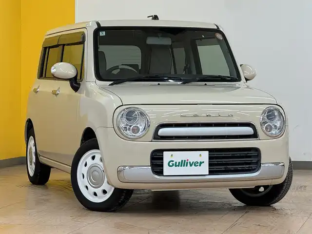 スズキ ラパン ショコラ X 群馬県 2014(平26)年 7.4万km ミルクティーベージュメタリック 社外７インチナビ/・AM/FM/フルセグTV/・CD/DVD/MSV/キセノンヘッドライト/レザーシート/ETC/純正フロアマット/純正ドアバイザー/スマートキー/プッシュスタート