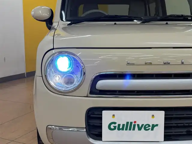 スズキ ラパン ショコラ X 群馬県 2014(平26)年 7.4万km ミルクティーベージュメタリック 社外７インチナビ/・AM/FM/フルセグTV/・CD/DVD/MSV/キセノンヘッドライト/レザーシート/ETC/純正フロアマット/純正ドアバイザー/スマートキー/プッシュスタート