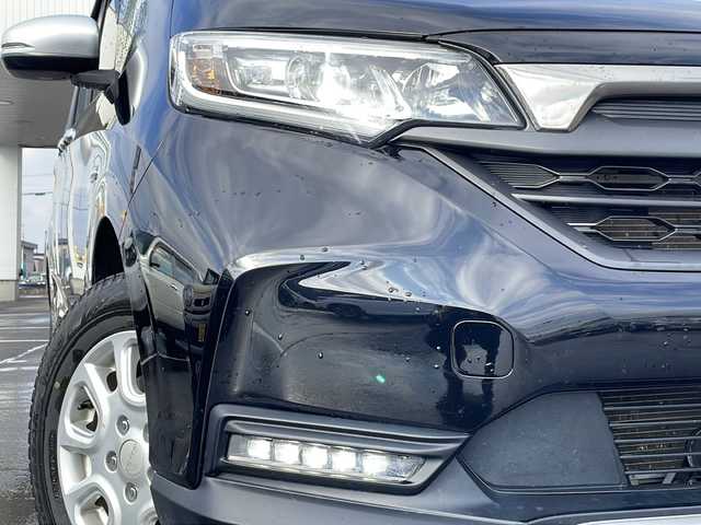 ホンダ フリード＋ ハイブリット クロスター ホンダセンシング 道北・旭川 2021(令3)年 5.8万km クリスタルブラックパール /４WD//禁煙車//寒冷地仕様//法人ワンオーナー//純正メモリナビ/CD/DVD/SD/BT/USB/TV//両側パワースライドドア//純正エンジンスターター//ホンダセンシング/衝突軽減ブレーキ/誤発進抑制機能/後方誤発進抑制機能/歩行者事故低減ステアリング/路外逸脱抑制機能/先行車発進お知らせ機能/標識認識機能/ACC/LKAS//バックカメラ//オートエアコン//フロントデアイサー//ビルトインETC//ミラーヒーター//前席シートヒーター//革巻きステアリング//ステリングスイッチ//リアサンシェード//エコモード//電動格納ミラー//ドアバイザー//ルーフレール//オートライト//LEDヘッドライト//LEDフォグランプ//ミラーウィンカー//夏タイヤ積込み//スペアキー//保証書//取説