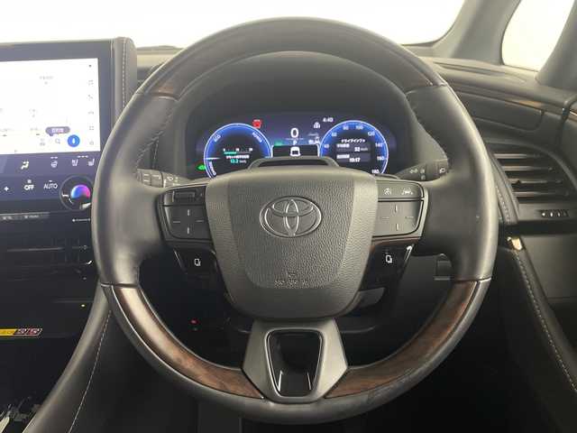 トヨタ アルファードハイブリット Z 埼玉県 2024(令6)年 1.4万km プラチナホワイトパールマイカ 独立ムーンルーフ/後席モニター　/純正１２．３インチナビ機能付きディスプレイオーディオ　/全方位カメラ　/ＢＳＭ　/前後ドライブレコーダー　/ビルトインＥＴＣ２．０　/デジタルインナーミラー　/自動駐車システム　/アダプティブクルーズコントロール/レーンキープアシスト/衝突軽減システム/シートヒーター/エアシート/パワーシート/電動リアゲート/オートブレーキホールド/電子パーキング/オートマティックハイビーム/前後コーナーセンサー/ワイヤレス充電器/オットマン/１００V充電/ヘッドアップディスプレイ/パドルシフト/純正アルミホイール/純正フロアマット/LEDヘッドライト