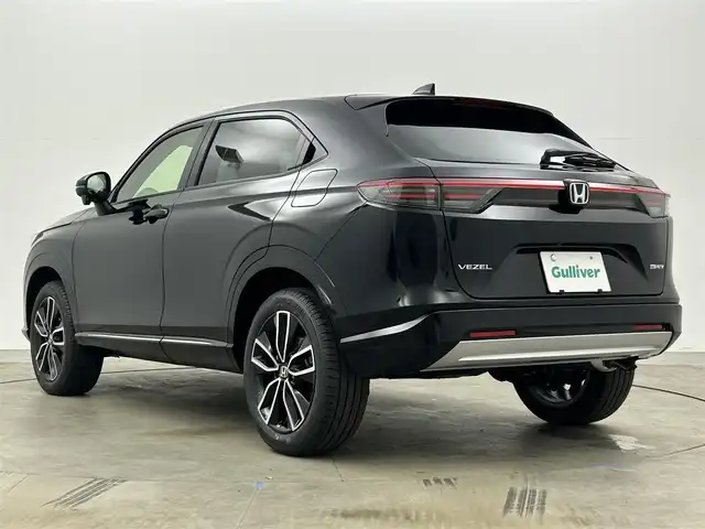 ホンダ ヴェゼル ハイブリッド e:HEV Z 岡山県 2025(令7)年 0.1千km クリスタルブラックパール 登録済未使用車/Honda CONNECT9インチディスプレー/【Bluetooth/フルセグTV/Carplay】/ワイヤレス充電　/ビルトインETC2.0/バックカメラ/パドルシフト/Honda SENSING/・トラフィックジャムアシスト/・アダプティブドライビングビーム/・急アクセル抑制機能/・衝突軽減ブレーキ（CMBS）/・渋滞追従機能付アダプティブクルーズコントロール（ACC）/・車線維持支援システム（LKAS）/・ブラインドスポットインフォメーション/セーフティ・サポートカーS〈ワイド〉/ステアリングヒーター/運転席＆助手席シートヒーター/オートブレーキホールド/スマートキー×2/新車保証書/取扱説明書/ナビ取扱説明書