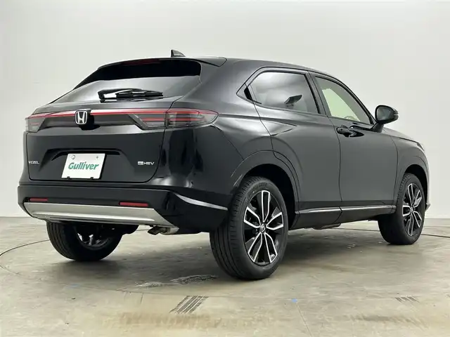 ホンダ ヴェゼル ハイブリッド e:HEV Z 岡山県 2025(令7)年 0.1千km クリスタルブラックパール 登録済未使用車/Honda CONNECT9インチディスプレー/【Bluetooth/フルセグTV/Carplay】/ワイヤレス充電　/ビルトインETC2.0/バックカメラ/パドルシフト/Honda SENSING/・トラフィックジャムアシスト/・アダプティブドライビングビーム/・急アクセル抑制機能/・衝突軽減ブレーキ（CMBS）/・渋滞追従機能付アダプティブクルーズコントロール（ACC）/・車線維持支援システム（LKAS）/・ブラインドスポットインフォメーション/セーフティ・サポートカーS〈ワイド〉/ステアリングヒーター/運転席＆助手席シートヒーター/オートブレーキホールド/スマートキー×2/新車保証書/取扱説明書/ナビ取扱説明書