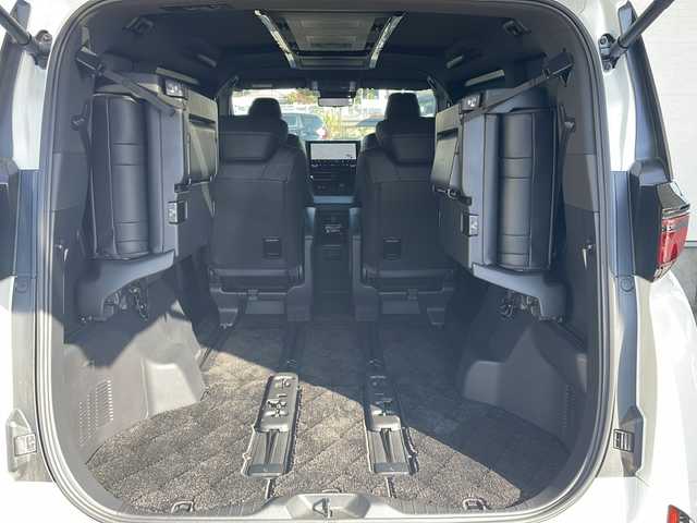 トヨタ ヴェルファイア ハイブリット Z プレミア 愛知県 2024(令6)年 2万km プラチナホワイトパールマイカ ワンオーナー/左右独立ムーンルーフ/トヨタチームメイト/【アドバンストパーク・パーキングサポートブレーキ（周辺静止物）・アドバンストドライブ・緊急時操舵支援・フロントクロストラフィックアラート・レーンチェンジアシスト・ドライバーモニターカメラ】/Toyota Safety Sense/【プリクラッシュセーフティ・レーントレーシングアシスト・全車速追従機能付レーダークルーズコントロール・アダプティブハイビームシステム/・ロードサインアシスト・ドライバー異常時対応システム・プロアクティブドライビングアシスト・発進遅れ告知機能・BSM】/パーキングサポートブレーキ/デジタルインナーミラー/14インチディスプレイオーディオ/【車載ナビ・地デジTV・Mira cast】/純正フリップダウンモニター/ETC2.0/パノラミックビューモニター/ヘッドアップディスプレイ/両側パワースライドドア/パワーバックドア/本革シート/シートヒーター/ベンチレーション/ステアリングヒーター/置くだけ充電/新車保証書/スペアキーあり