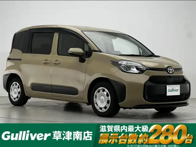 トヨタ シエンタ G 滋賀県 2025(令7)年 1.2万km ベージュ 純正8インチナビ/Bluetooth/USB/パノラミックビューモニター/両側パワースライドドア/セーフティセンス/コンフォートパッケージ/パーキングサポートブレーキ/ブラインドスポットモニター/LEDヘッドライト/ビルトインETC/純正フロアマット/ドアバイザー/プッシュスタート/スマートキー