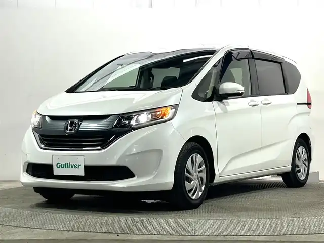 ホンダ フリード G ホンダセンシング 大阪府 2017(平29)年 2.5万km ホワイトオーキッドパール 純正ナビ(フルセグ/DVD再生/Bluetooth) バックカメラ ETC 両側パワースライドドア 衝突軽減 レーダークルコン レーンアシスト オートライト スマートキー Pスタート ドラレコ