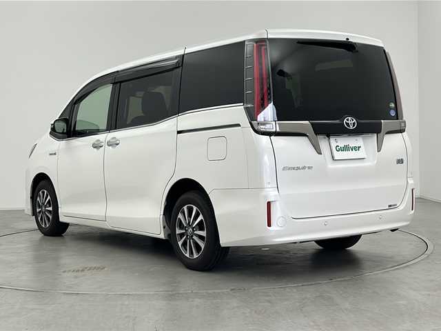 トヨタ エスクァイア ハイブリッド Gi プレミアムパッケージ ブラックテーラード 群馬県 2019(令1)年 7.1万km ホワイトパールクリスタルシャイン 純正９型ナビ　純正１２．１型後席モニター　バックカメラ　ハーフレザーシート　シートヒーター　ハンドルヒーター　前後ドラレコ　ビルトインＥＴＣ　両側電動スライドドア　衝突被害軽減ブレーキ　ＬＥＤ　禁煙車