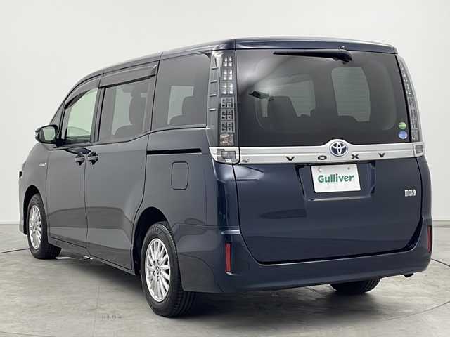 トヨタ ヴォクシー ハイブリッド V 三重県 2017(平29)年 3.2万km ブラッキッシュアゲハガラスフレーク 純正9型ナビ/【CD/DVD/SD/Bluetooth】/地デジ対応TV/バックカメラ/純正後席モニター/トヨタセーフティセンス/PCS/LKA/片側パワースライドドア/LEDヘッドライト/オートライト機能/ビルトインETC/革巻きステア/リモコン/クルーズコントロール/前席シートヒーター/ワンオーナー