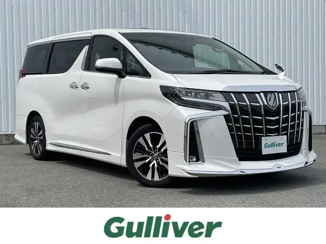 トヨタ アルファード S Cパッケージ 福岡県 2021(令3)年 4.7万km ホワイトパールクリスタルシャイン モデリスタフルエアロ（F、S、R、マフラー）/ツインムーンルーフ/純正12インチフリップダウンモニター/メーカー純正ＤＡナビ/フルセグTV/BT/applecarplay/androidauto/バックカメラ/ＰＣＳ/RCTA/黒革シート/両側パワースライドドア/パワーバックドア/デジタルインナーミラー/ＢＳＭ/レーダークルーズコントロール/前席パワーシート/前席シートヒーター＆シートベンチレーション/シートメモリー/オットマン/電動パーキング/ブレーキホールド/AC100V/ビルトインETC/LEDヘッドライト/フォグランプ/オートハイビーム/ロールサンシェード/純正アルミ