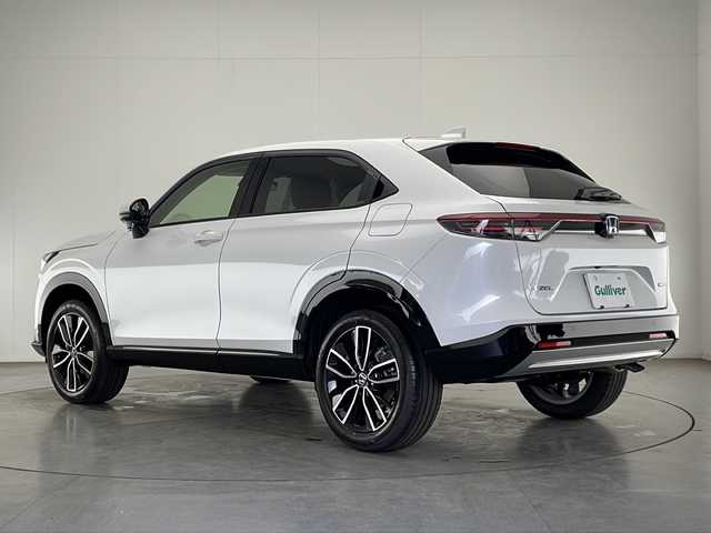 ホンダ ヴェゼル ハイブリッド e:HEV Z 宮崎県 2025(令7)年 0.1千km プラチナホワイトパール 禁煙車/ホンダセンシング/純正9型ディスプレイオーディオナビTV/（3VC4AG3/Honda CONNECT/FMAM/Bluetooth/フルセグTV）/純正ビルトインETC2.0車載器/純正フロントグリル（ベルリナブラック）/純正LEDオートライト/純正LEDフォグ/純正18インチアルミ/アダプティブクルーズコントロール/レーンディパーチャーアラート/ダウンヒルアシストコントロール/ブラインドスポットモニター/クリアランスソナー/ワイヤレス充電器/ハーフレザーシート/前席シートヒーター/ステアリングヒーター/デュアルオートエアコン/パワーバックドア/スマートキー/プッシュエンジンスタート/スペアキー/新車時保証書/取扱い説明書