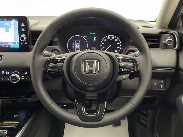 ホンダ ヴェゼル ハイブリッド e:HEV Z 宮崎県 2025(令7)年 0.1千km プラチナホワイトパール 禁煙車/ホンダセンシング/純正9型ディスプレイオーディオナビTV/（3VC4AG3/Honda CONNECT/FMAM/Bluetooth/フルセグTV）/純正ビルトインETC2.0車載器/純正フロントグリル（ベルリナブラック）/純正LEDオートライト/純正LEDフォグ/純正18インチアルミ/アダプティブクルーズコントロール/レーンディパーチャーアラート/ダウンヒルアシストコントロール/ブラインドスポットモニター/クリアランスソナー/ワイヤレス充電器/ハーフレザーシート/前席シートヒーター/ステアリングヒーター/デュアルオートエアコン/パワーバックドア/スマートキー/プッシュエンジンスタート/スペアキー/新車時保証書/取扱い説明書