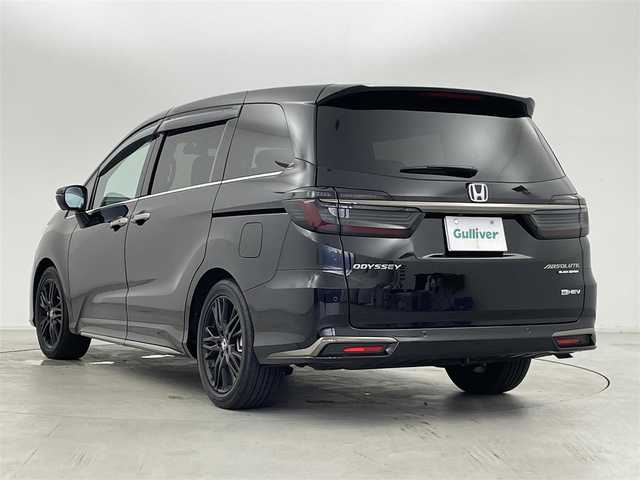 ホンダ オデッセイ ハイブリッド e:HEVアブソルート EXブラックED 群馬県 2024(令6)年 1万km 黒 純正11.4インチナビ/　(AM/FM/CD/DVD/SD/Bluetooth/フルセグTV/AppleCarPlay/AndroidAuto)/純正15.6インチフリップダウンモニター/マルチビューカメラシステム/純正前後ドライブレコーダー　（DRH-229ND）/ハンズフリーアクセスパワーテールゲート/両側パワースライドドア/本革シート/前席パワーシート/2列目両側アームレスト付4ウェイパワーシート/　(リクライニング/オットマン)/前席/2列目シートヒーター/ホンダセンシング/・衝突軽減ブレーキ/近距離衝突軽減ブレーキ/・路外逸脱抑制機能/車線維持支援システム/歩行者事故低減ステアリング/・渋滞追従機能付アダプティブクルーズコントロール/・オートハイビーム/・ブラインドスポットインフォメーション/パーキングセンサーシステム/・標識認識機能/先行車発進お知らせ機能/・誤発進抑制機能/後方誤発進抑制機能/・後退出庫サポート/急アクセル抑制機能/18インチアルミホイール マットベルリナブラック/ワイヤレス充電