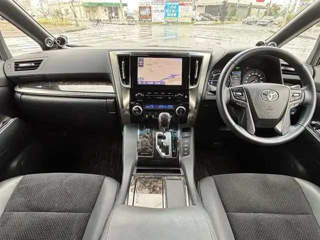 トヨタ ヴェルファイア ハイブリット ゴールデンアイズⅡ 宮城県 2021(令3)年 5.6万km ブラック 登録時走行距離55192km/後席モニター/1オーナー/ディーラーオプションナビ/フルセグTV/CD/DVD/Bluetooth/バックカメラ/3眼LEDヘッドライト/シーケンシャルウインカー/レーンキープ/追従クルーズコントロール/両側パワースライド/衝突軽減ブレーキ/プッシュスタート/スマートキー/ドライブレコーダー/ETC/ACC/オートハイビーム/パワーバックドア/ハーフレザーシート