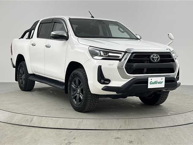 トヨタ ハイラックス Z 熊本県 2021(令3)年 4.8万km スーパーホワイトⅡ 禁煙車/衝突被害軽減ブレーキ/純正ナビTV/（NSZT-W68T/CD/DVD/Bluetooth/フルセグTV)/純正バックカメラ/純正ドライブレコーダー/純正OP/GRサイドステップ/純正OP/GRスポーツバー/純正LEDオートライト/純正LEDフォグ/純正17インチアルミ/純正フロアマット/アダプティブクルーズコントロール/レーンディパーチャーアラート/クリアランスソナー/ダウンヒルアシストコントロール/オートエアコン/本革巻ハンドル/オート電動格納ミラー/スマートキー/プッシュエンジンスタート/新車時保証書/取扱い説明書