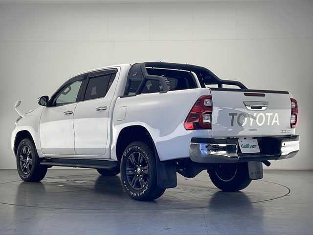 トヨタ ハイラックス Z 熊本県 2021(令3)年 4.8万km スーパーホワイトⅡ 禁煙車/衝突被害軽減ブレーキ/純正ナビTV/（NSZT-W68T/CD/DVD/Bluetooth/フルセグTV)/純正バックカメラ/純正ドライブレコーダー/純正OP/GRサイドステップ/純正OP/GRスポーツバー/純正LEDオートライト/純正LEDフォグ/純正17インチアルミ/純正フロアマット/アダプティブクルーズコントロール/レーンディパーチャーアラート/クリアランスソナー/ダウンヒルアシストコントロール/オートエアコン/本革巻ハンドル/オート電動格納ミラー/スマートキー/プッシュエンジンスタート/新車時保証書/取扱い説明書