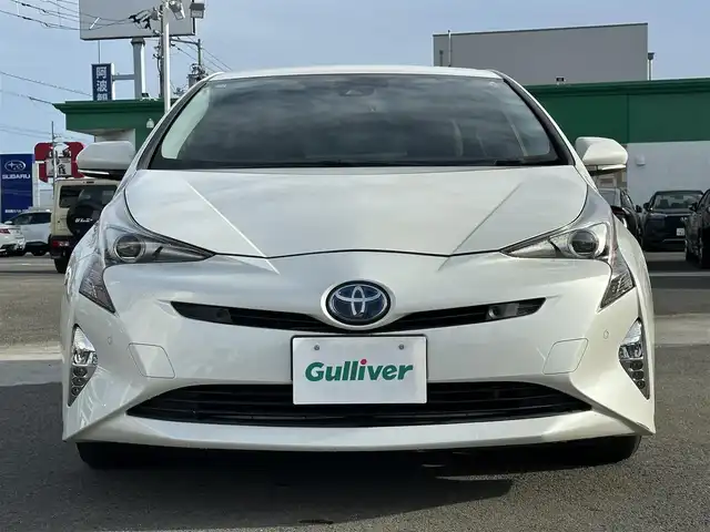 トヨタ プリウス Sセーフティプラス 徳島県 2016(平28)年 1.9万km ホワイトパールクリスタルシャイン 純正9インチナビ/（Bluetooth/フルセグTV/CD/DVD/FM/AM）/バックカメラ/レーダークルーズコントロール/PCS/LDA/クリアランスソナー/HUD/LEDヘッドライト/オートライト/オートハイビーム/純正15AW/純正フロアマット/電格ミラー/ドアバイザー/ビルトインETC